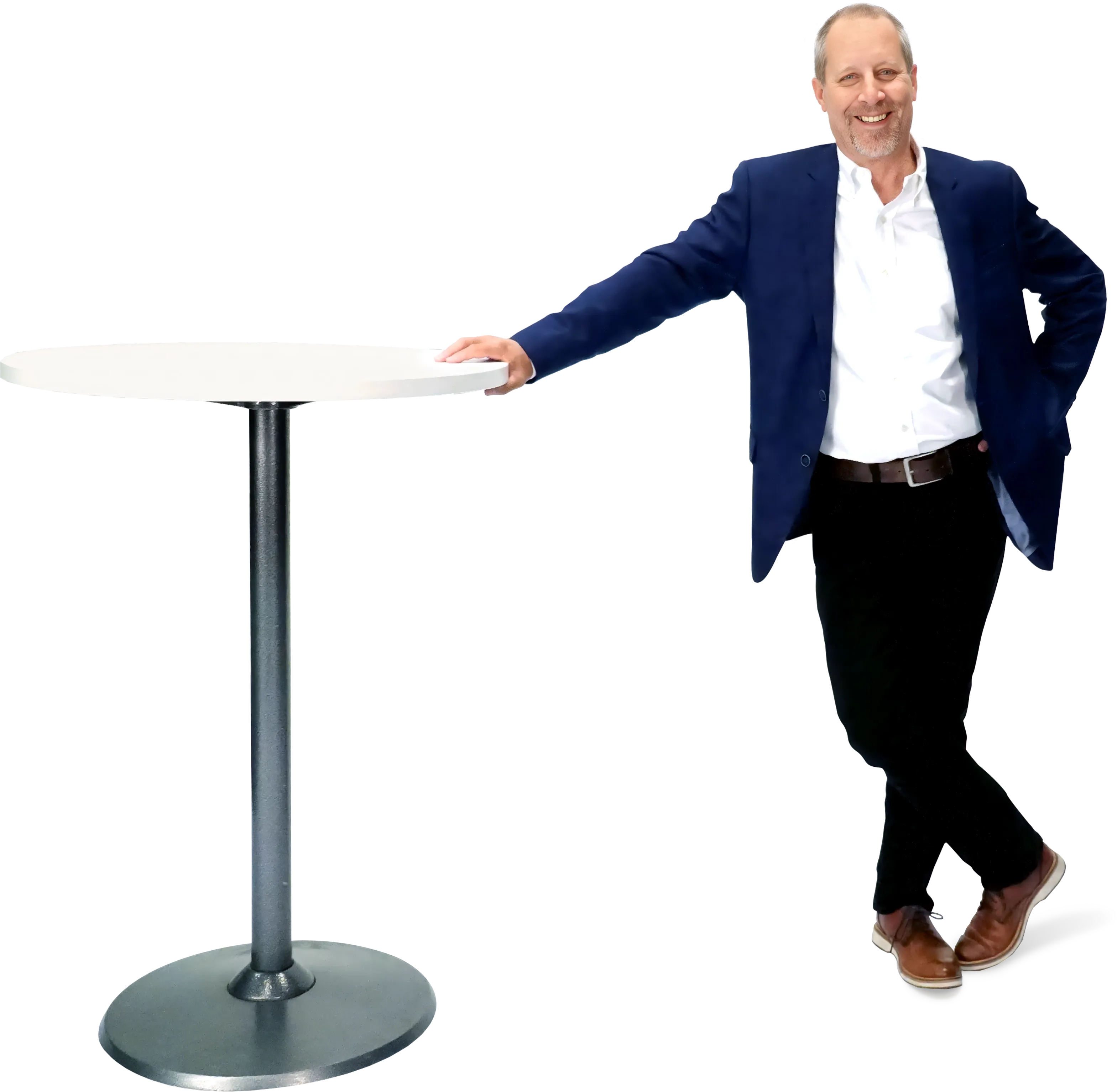 Blueprint President Michael Kelly standing, leaning on a circular table